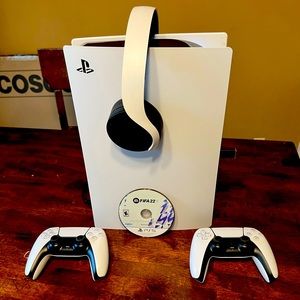 PS5 with two controllers,Headphones,and FIFA 22 game